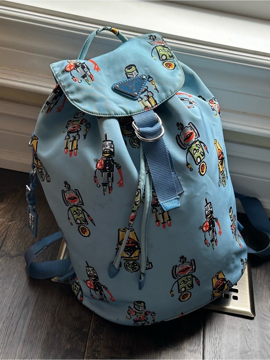 Prada Handbags - PRADA Azzurro Tessuto Nylon Robot Print Backpack 1BZ032